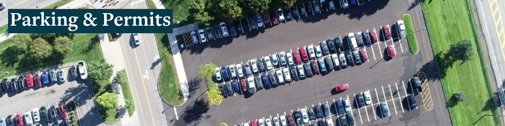 "parking & permits" aerial photo of a parking lot