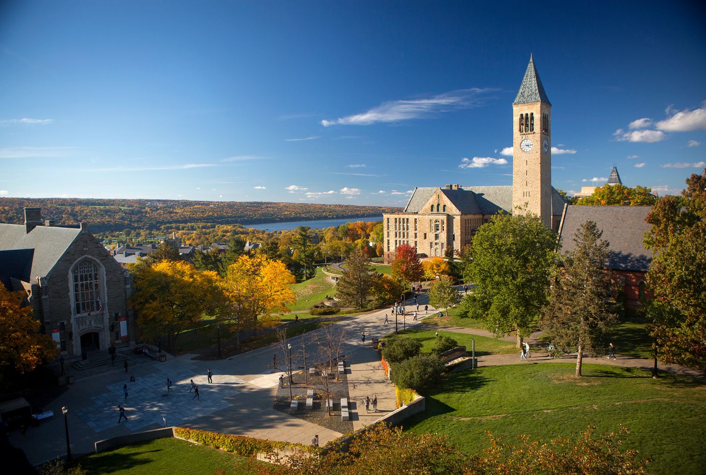 landscape view of McGraw tower and surrounding buildings overlooking Cayuga Lake