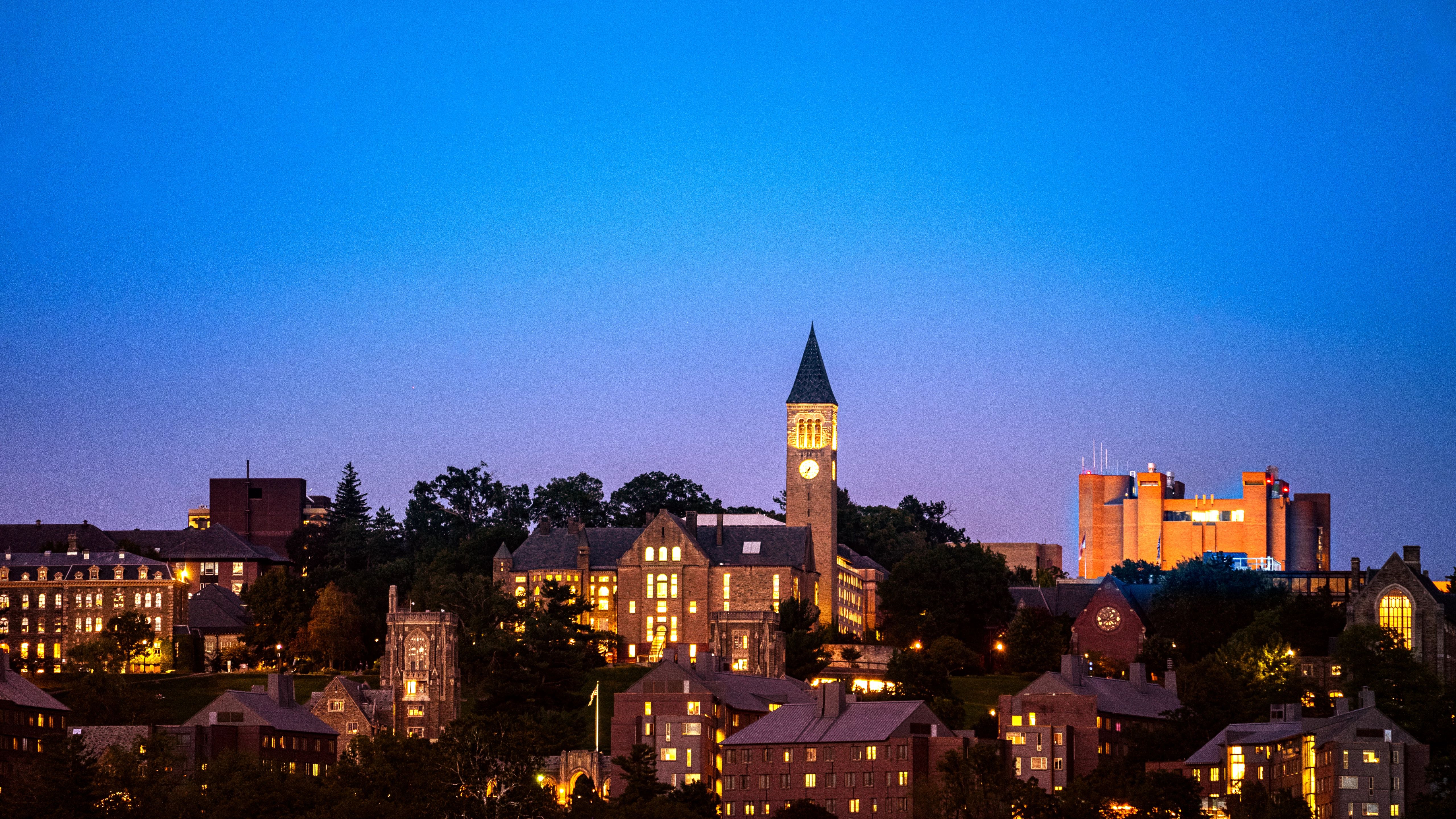 Campus picture at night showcasing energy and cooling being provided